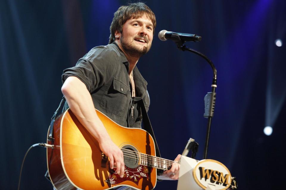 FILE - In this March 18, 2011 file photo, country singer Eric Church performs at the Grand Ole Opry in Nashville, Tenn. The first iHeartRadio Country Festival will be held March 29, 2014, in Austin, Texas, with Luke Bryan, Jason Aldean, Eric Church, Carrie Underwood, Lady Antebellum and Florida Georgia Line heading up the initial lineup. (AP Photo/Ed Rode, file)