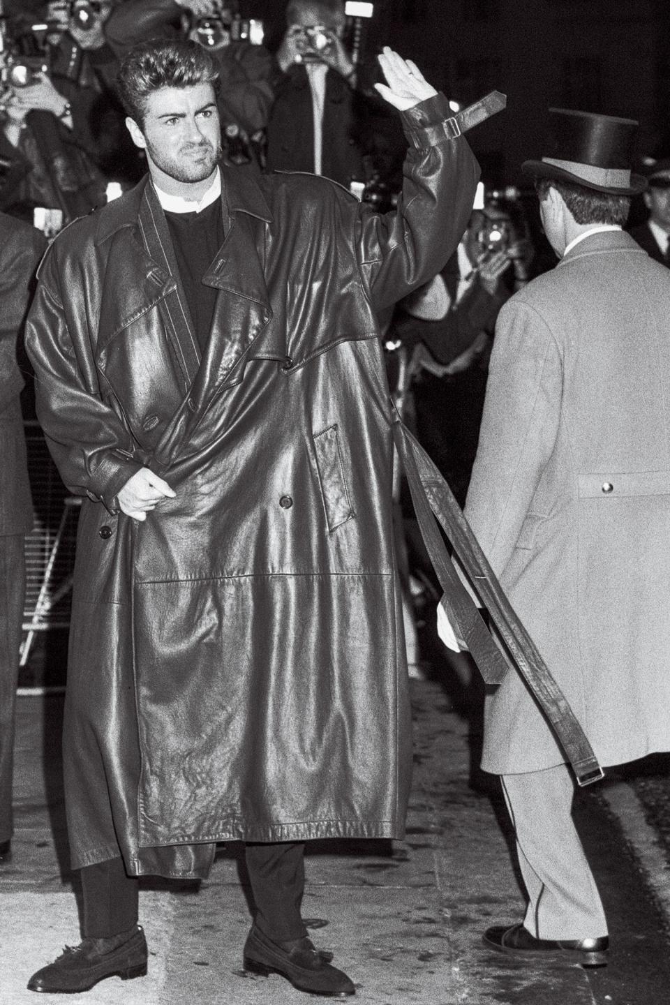 Michael and his oversize trench at the launch party for his first solo album, Faith, in 1987 at London’s Savoy Hotel.
