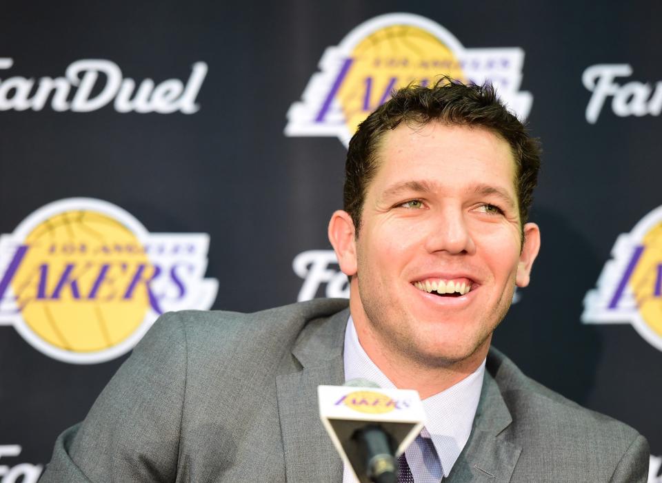 New Lakers head coach Luke Walton gets comfortable in the spotlight. (Getty Images)