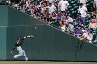 Jun 23, 2018; Denver, CO, USA; Miami Marlins left fielder J.B. Shuck (3) makes a catch for an out in the eighth inning against the Colorado Rockies at Coors Field. Mandatory Credit: Isaiah J. Downing-USA TODAY Sports