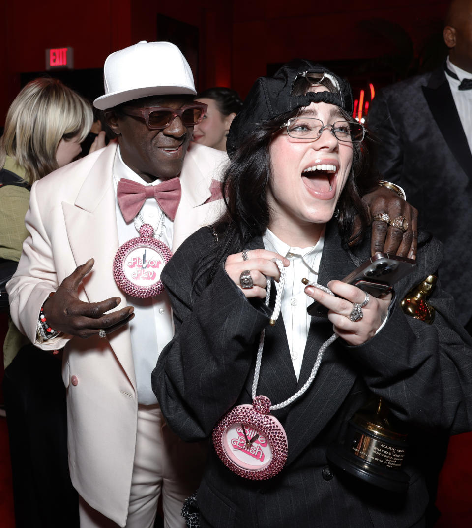 BEVERLY HILLS, CALIFORNIA - MARCH 10: EXCLUSIVE ACCESS, SPECIAL RATES APPLY. (L-R) Flavor Flav and Billie Eilish attend the 2024 Vanity Fair Oscar Party Hosted By Radhika Jones at Wallis Annenberg Center for the Performing Arts on March 10, 2024 in Beverly Hills, California. (Photo by Stefanie Keenan/VF24/WireImage for Vanity Fair )