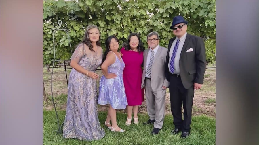 Alberto Castaneda and loved ones in a family photo.