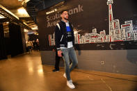 Ben Simmons #25 of the Philadelphia 76ers arrives ahead of Game Two wearing a Golden Bear bomber jacket and A-Cold-Wall x Nike sneakers.
