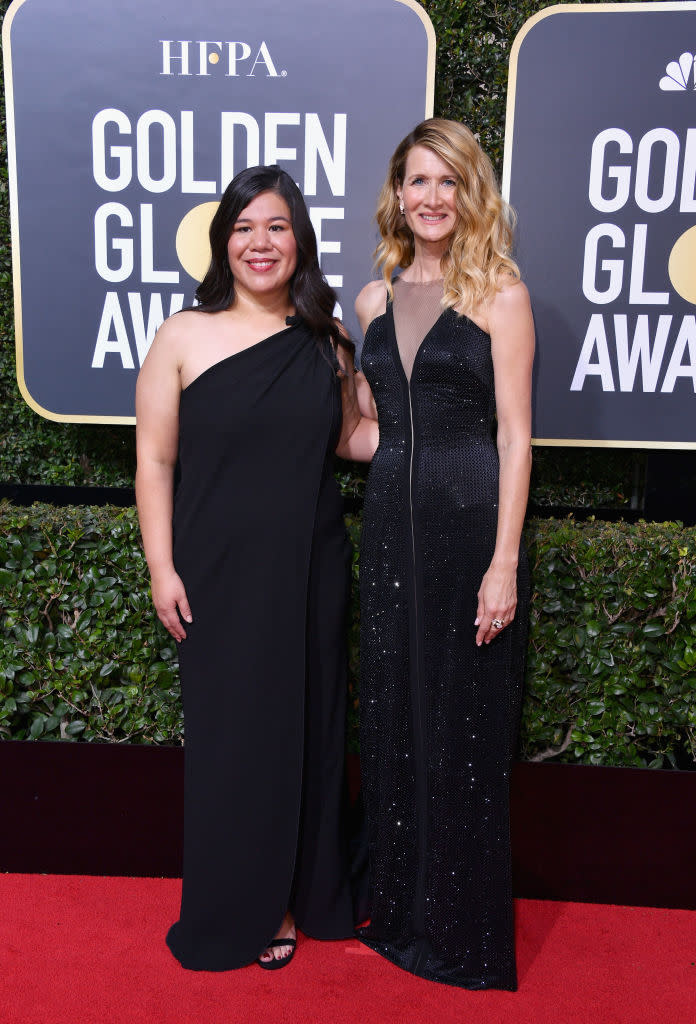 Laura Dern and Monica Ramirez attend the Golden Globe Awards on Jan. 7, 2018 in Beverly Hills, Calif. (Photo: Getty Images)