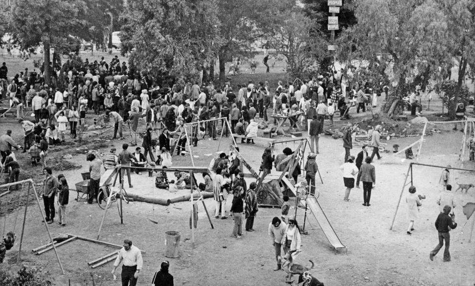 A black-and-white photo of a crowd in People's Park.