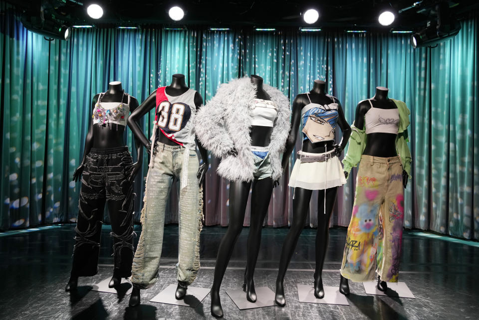 Outfits worn by the Korean pop group LE SSERAFIM in their "Easy" music video are previewed at the K-pop HYBE Exhibit at the Grammy Museum, Friday, June 28, 2024, in Los Angeles. (AP Photo/Chris Pizzello)