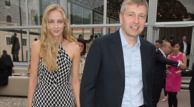 The Russian billionaire pictured with an unidentified woman. Source: Supplied