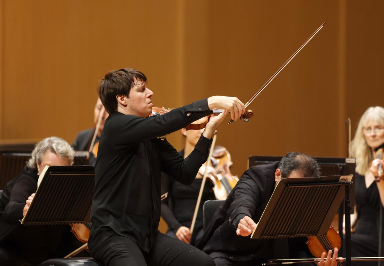 Joshua Bell directs the Academy of St. Martin of the Fields orchestra while performing with the chamber orchestra, which will be performing March 26, 2024, at the Indiana University Auditorium.