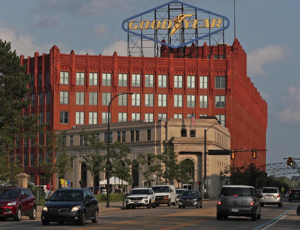 Traffic drives along East Market street past the newly relit Goodyear sign in Akron. The famous sign has been dark since 2015.