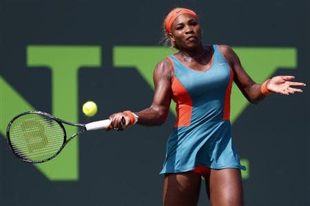 Mar 24, 2014; Miami, FL, USA; Serena Williams hits a forehand against Coco Vandeweghe (not pictured) on day eight of the Sony Open at Crandon Tennis Center. Williams won 6-3, 6-3. Geoff Burke-USA TODAY Sports