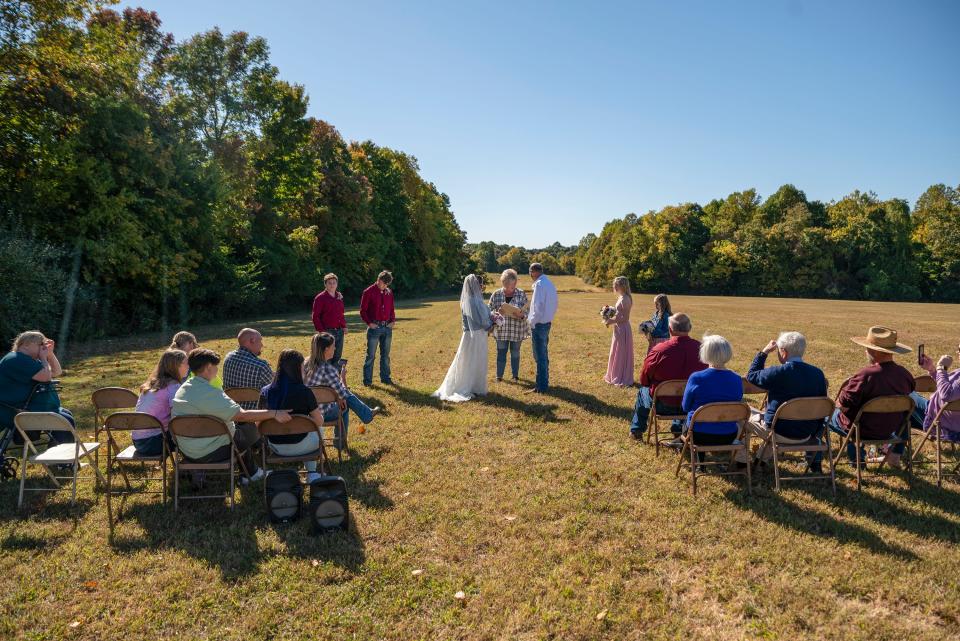 Jesse and Samantha Snellen opted to have an intimate wedding on their property on Oct. 9, 2022. They'd originally planned a large reception at River's Edge event venue in Bullitt County, but their event coordinator, Jana Holland, helped them downscale it after Jesse Snellen was diagnosed with stage 4 lung cancer the week before the wedding.