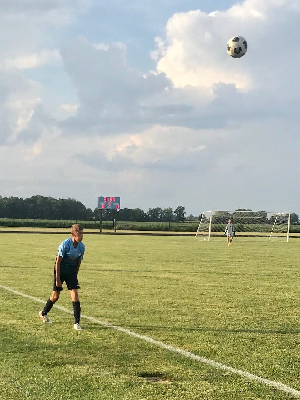 Hudson Pollock of River Valley throws in a ball from the sideline during a boys soccer home match with Marion Harding last season.