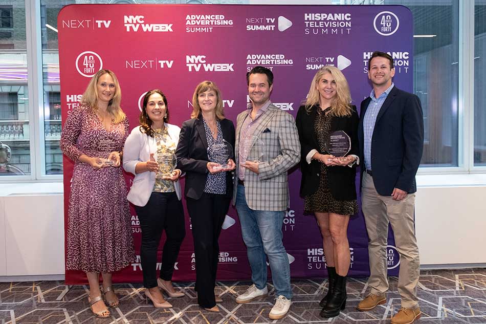  Accepting the Advanced Advertising Innovation Awards (l. to r.): Kristin Wnuk, Roku; Trish Mielke, Hershey; Beth Plummer, Spectrum Reach; Scott Swanson, iSpot.TV; Abbey Thomas, OpenAP; and Bennett Strauss, Mediacom.  