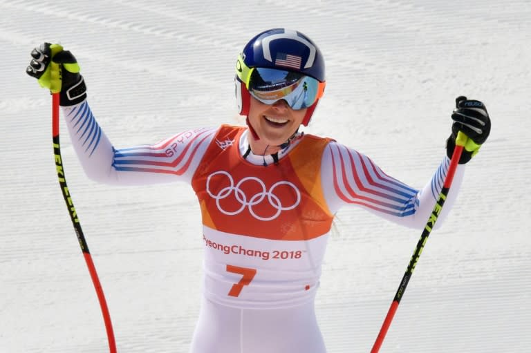 USA's Lindsey Vonn, who won the bronze medal, crosses the finish line in the women's downhill at the Pyeongchang 2018 Winter Olympic Games on Wednesday