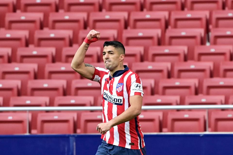 Atletico Madrid forward Luis Suarez celebrates after scoring during the Spanish league football match Club Atletico de Madrid against Real Madrid CF at the Wanda Metropolitano stadium in Madrid on March 7, 2021.