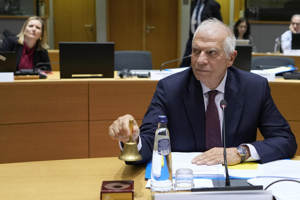 European Union foreign policy chief Josep Borrell rings a bell to signify the start of a meeting of EU foreign ministers at the European Council building in Brussels, Monday, Jan. 22, 2024. European Union Foreign Affairs Ministers meet in Brussels on Monday to discuss the situation in the Middle East and in Ukraine. (AP Photo/Virginia Mayo)