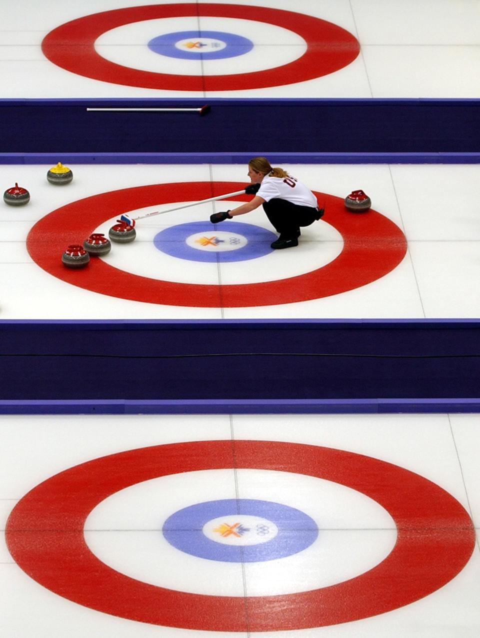 USA’s Deborah McCormick waits in the house for a stone as USA battles Sweden in curling at the Ice Sheet at Ogden on Tuesday, Feb. 12, 2002. | Jason Olson, Deseret News