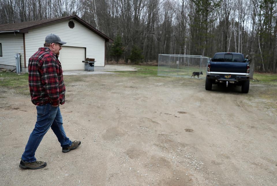 Eric Phillips, a Billerud paper mill employee who contracted blastomycosis, at his home on Wednesday, April 19, 2023, in Gladstone, Michigan. Phillips, who was hospitalized for several weeks, continues to require medication as he slowly recovers from the fungal infection. A contract employee recently died from blastomycosis, a fungal infection that has affected nearly 100 employees. The paper mill will close for up to three weeks as cleaning and investigation intensify in response to the fungal infection outbreak at the plant.