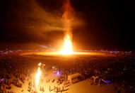 <p>The Man is engulfed in flames as approximately 70,000 people from all over the world gathered for the annual Burning Man arts and music festival in the Black Rock Desert of Nevada, Sept. 2, 2017. (Photo: Jim Urquhart/Reuters) </p>