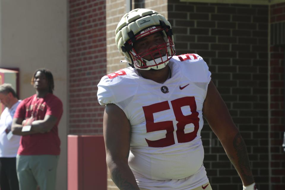 FSU offensive lineman Bless Harris finishes a rep during one of the Seminoles' 2022 spring football practices.