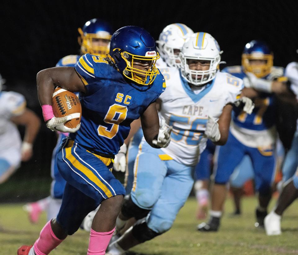 Sussex Central's Kevon Moore-Briddell (9) runs towards the end zone in their home game against Cape Henlopen.