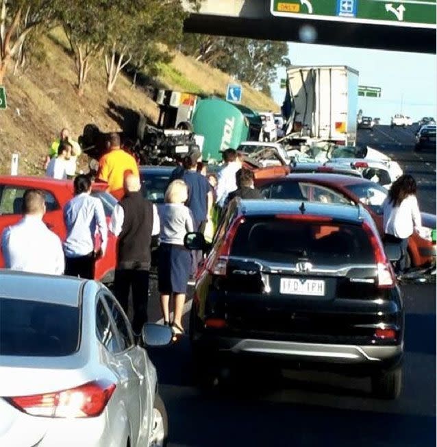 One person is dead and at least six more injured after a petrol tanker rolled on a Melbourne freeway. Picture: Twitter/Dave_B86