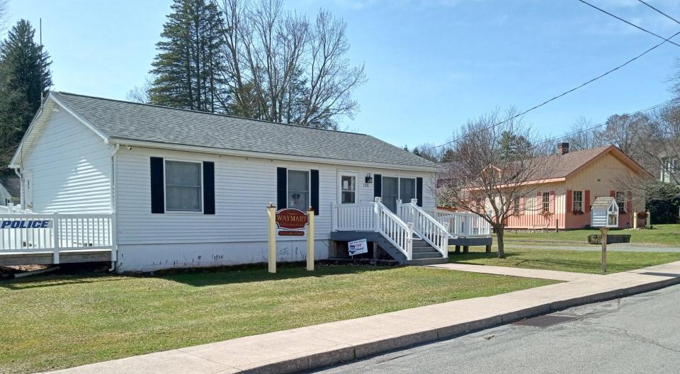 The Waymart borough offices at 128 South St. are also home to the borough police department. Council meetings are held on the second Tuesday at 6:30 p.m. Visit waymartborough.org or call 570-488-5400 for information. At right is the Waymart Area Historical Society gravity railroad depot museum.