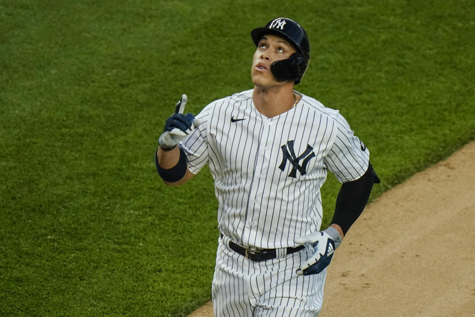 New York Yankees' Aaron Judge reacts as he runs the bases after hitting a two-run home run during the fourth inning of the second game of a baseball doubleheader against the Toronto Blue Jays Thursday, May 27, 2021, in New York. (AP Photo/Frank Franklin II)