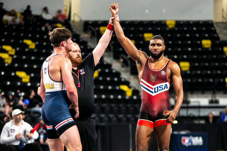 Nate Jackson, right, will wrestle for Team USA this weekend at the UWW World Cup in Coralville.