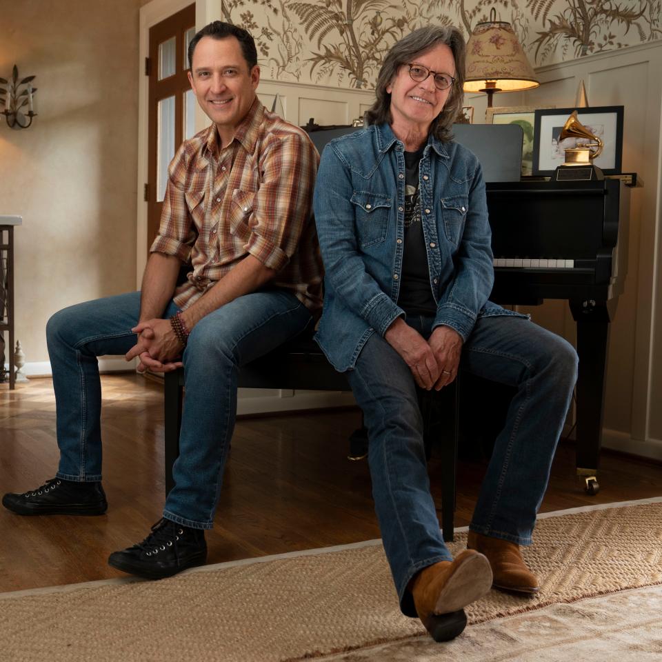 Jaime Hanna and his father, Jeff Hanna, co-founding member of the iconic Americana group The Nitty Gritty Dirt Band, pose for a portrait Tuesday, Sept. 6, 2022, in Nashville, Tenn.