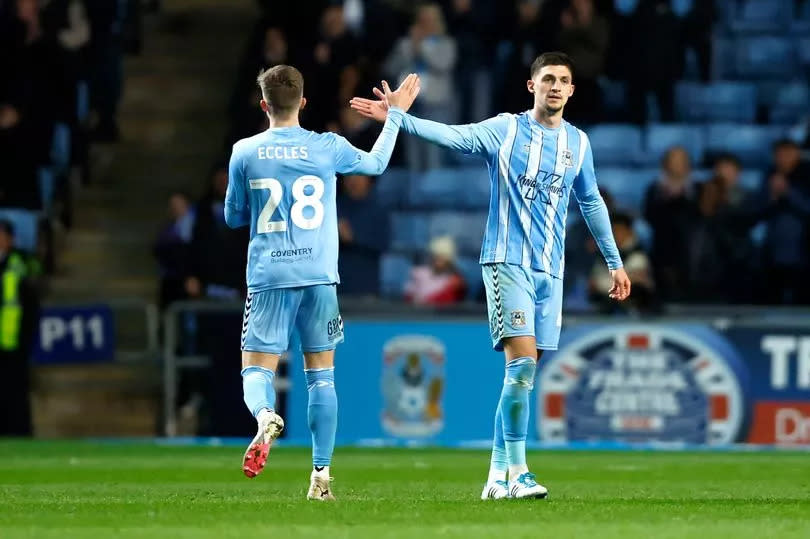 Bobby Thomas (right) celebrates after scoring Coventry City's second goal against Hull with team-mate Josh Eccles.