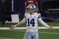 Dallas Cowboys quarterback Andy Dalton (14) gestures after throwing an interception in the second half of an NFL football game against the Arizona Cardinals in Arlington, Texas, Monday, Oct. 19, 2020. (AP Photo/Ron Jenkins)