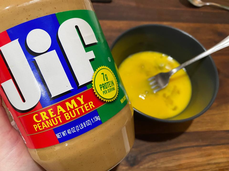jar of jif peanut butter in front of a bowl of eggs