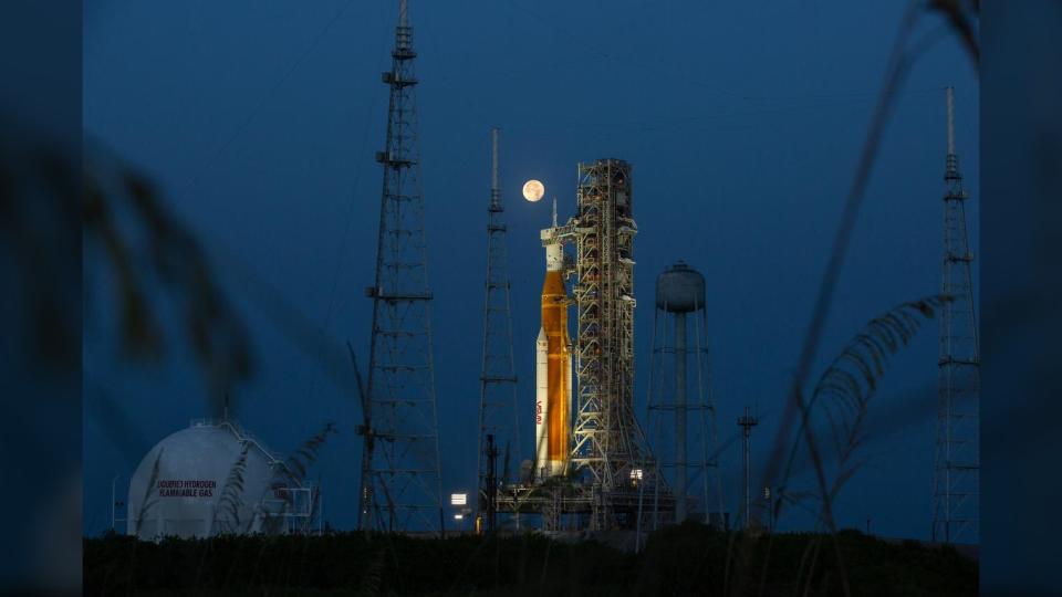 Full moon shines on Artemis I Space Launch System (SLS) and Orion spacecraft