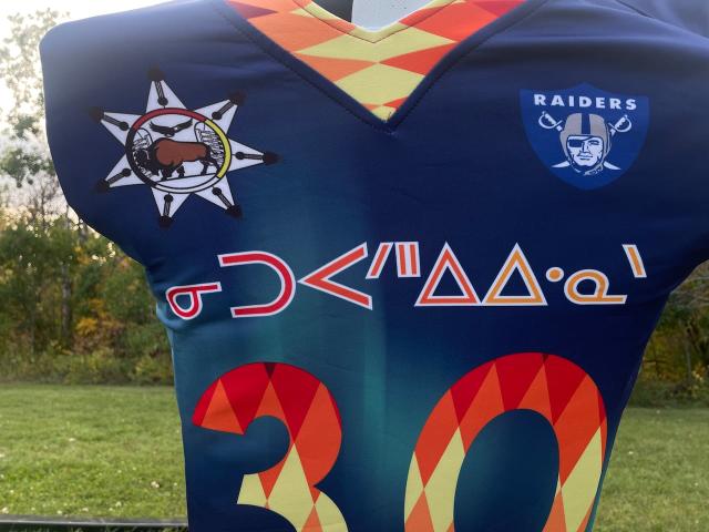 Indigenous players design reconciliation jerseys for Winnipeg high school  team