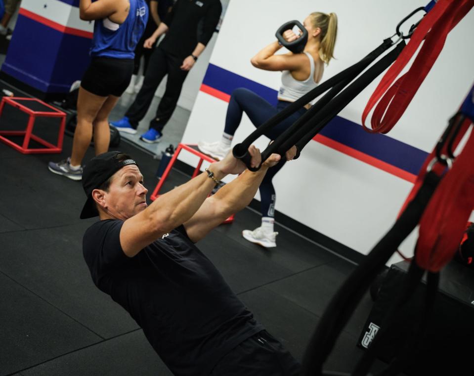 Mark Wahlberg on the TRX machine