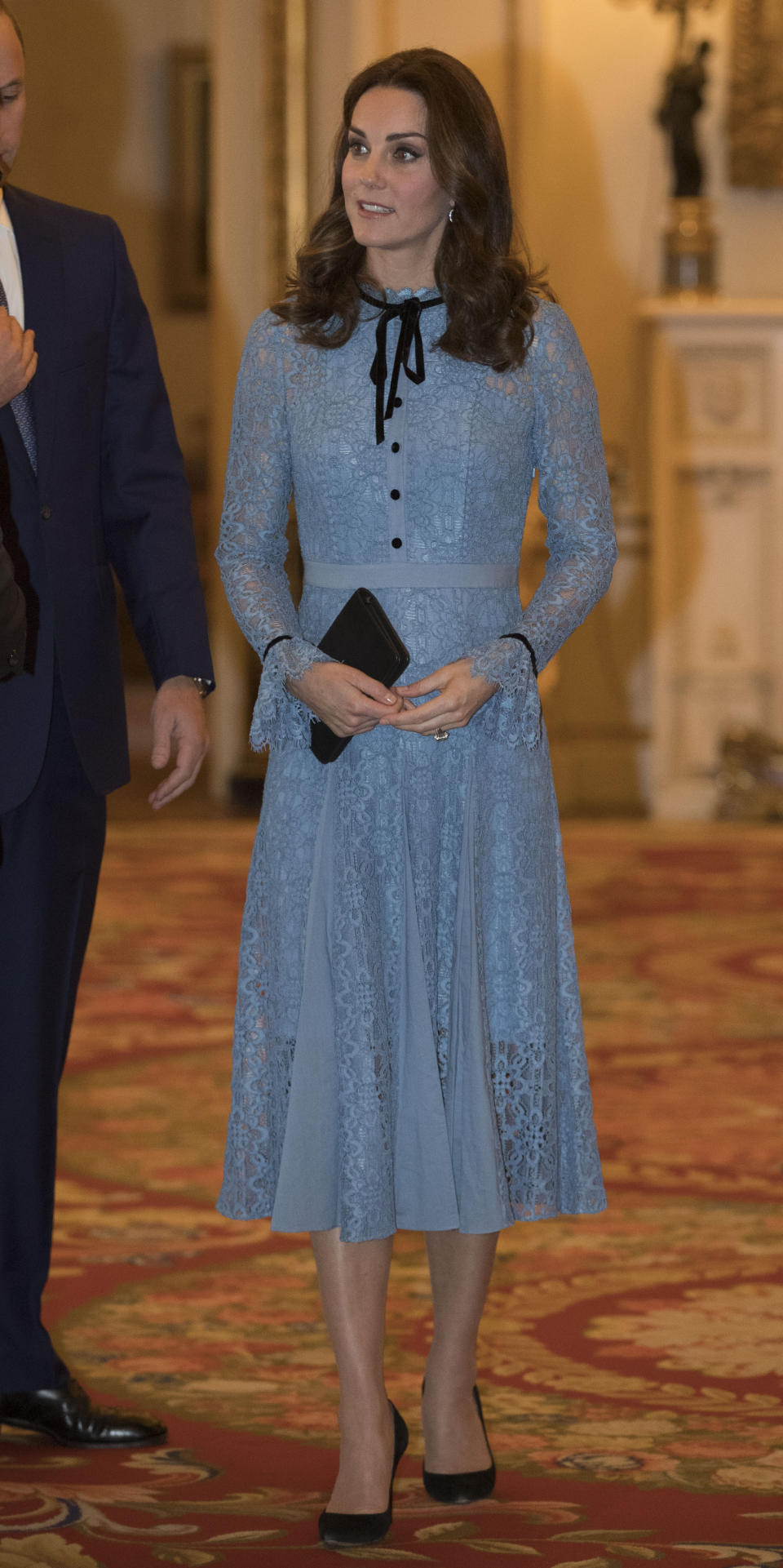 Kate’s tiny baby bump was just visible in a powder blue dress by Temperley London [Photo: PA]
