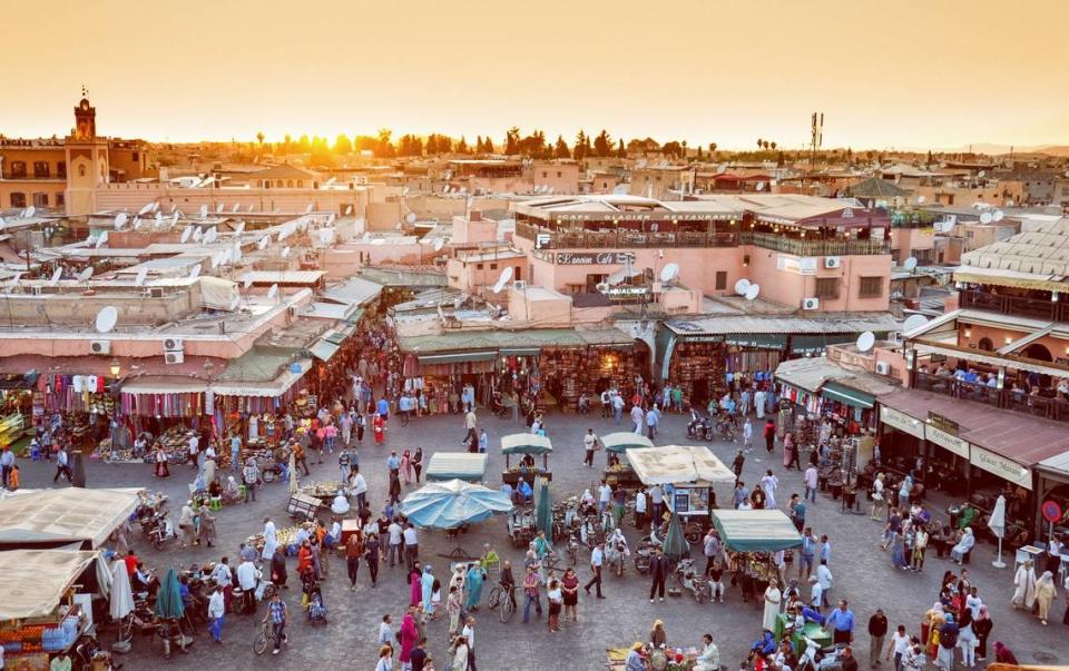 An aerial view of a market in the historic town center of Marrakesh, Morocco.