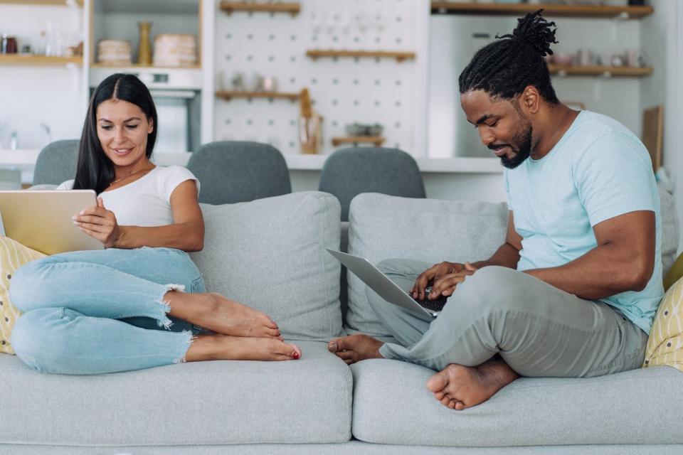 Individual investors looking for stocks on their devices.