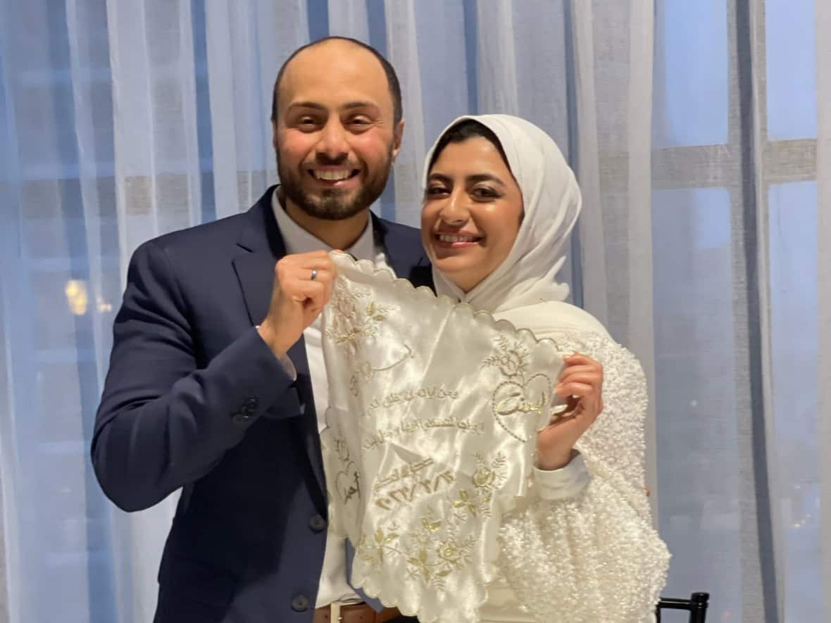 Ahmed Emam and his wife, Bassant, have been planning a summer wedding celebration in Egypt, but a delayed permanent residency application could force the couple apart. (Submitted by Ahmed Emam - image credit)