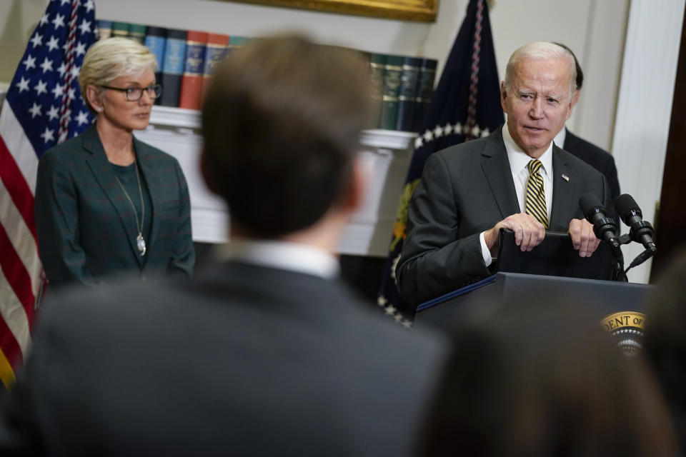 Energy Secretary Jennifer Granholm listens as President Joe Biden speaks during an event in the Roosevelt Room of the White House, Wednesday, Oct. 19, 2022, in Washington. (AP Photo/Evan Vucci)