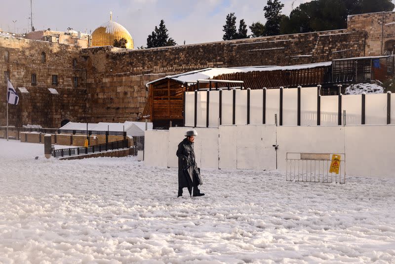 Snow at Jerusalem's Western Wall, Judaism's holiest prayer site