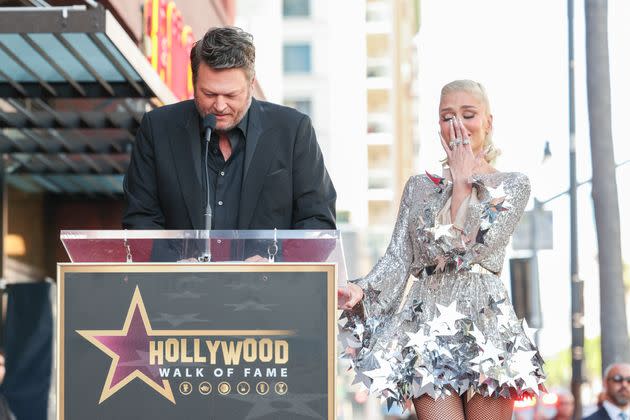 Blake Shelton, left, speaks at Gwen Stefani's Hollywood Walk of Fame ceremony on Oct. 19. 