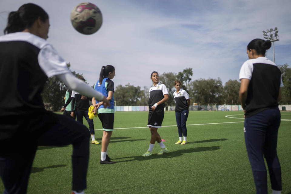 Women players of ASFAR soccer team take part in a training session ahead of a league match the next day in Rabat, Morocco, Tuesday, May 16, 2023. (AP Photo/Mosa'ab Elshamy)