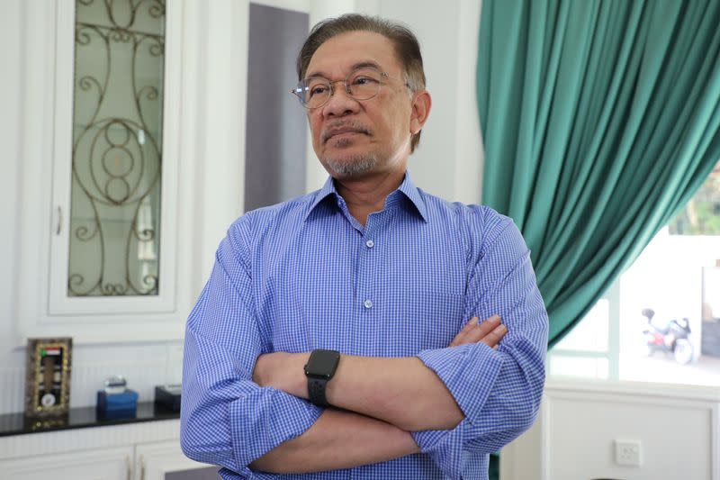 Malaysia's politician Anwar Ibrahim reacts during an interview with Reuters in Petaling Jaya