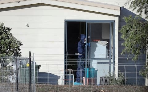 Police forensics investigate the death of seven people in a suspected murder-suicide in Osmington - Credit: Richard Wainwright/AAP Image