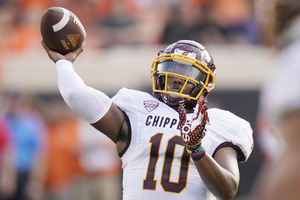 Central Michigan quarterback Daniel Richardson throws a pass during the first half of an NCAA college football game against Oklahoma State, Thursday, Sept. 1, 2022, in Stillwater, Okla. (AP Photo/Sue Ogrocki)