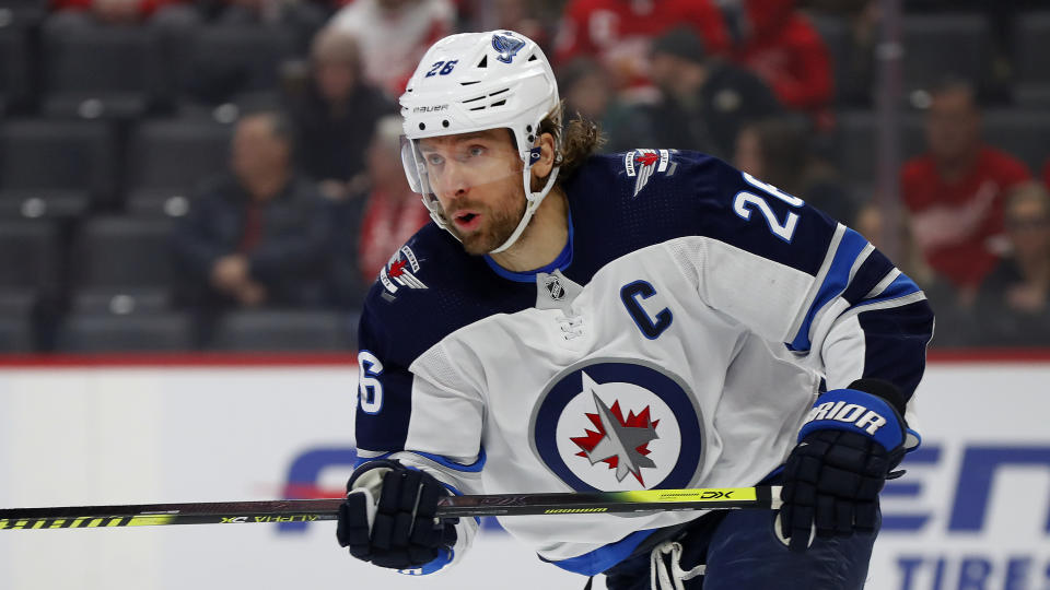 Winnipeg Jets right wing Blake Wheeler plays against the Detroit Red Wings in the first period of an NHL hockey game Thursday, Dec. 12, 2019, in Detroit. (AP Photo/Paul Sancya)