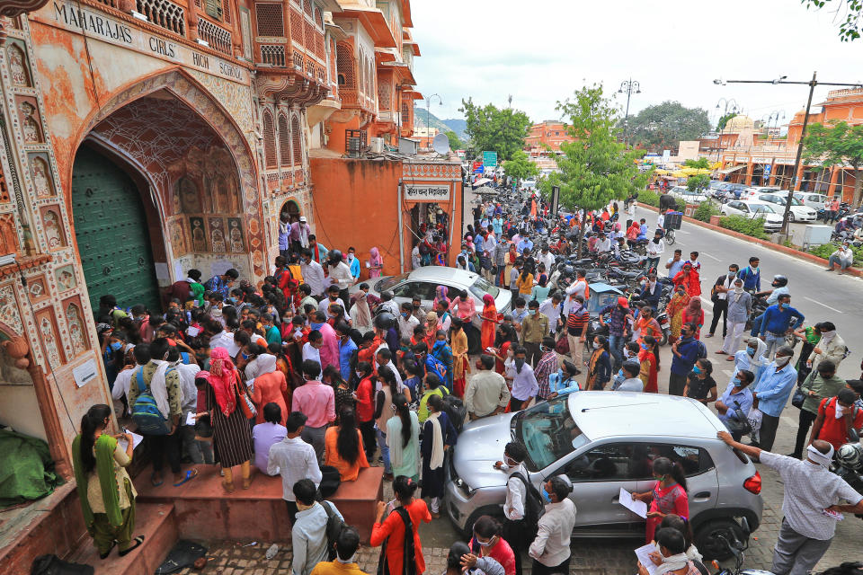 Students Crowd Outside An Examination Centre In Jaipur