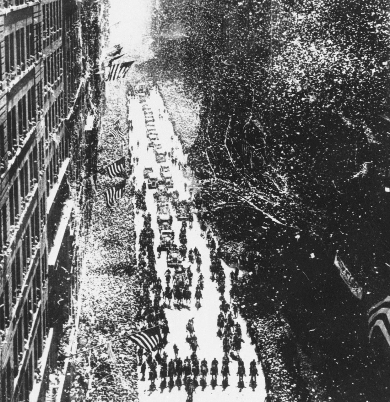 This is a general view of the ticker tape parade and crowds lining the streets in New York City for flying hero Charles A. Lindbergh, June 13, 1927. The New York Times estimated the crowds to number 4 million people. 